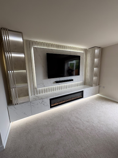 Calacatta marble and acoustic slat media wall suite