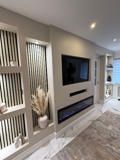 Full height acoustic slatted media wall installation