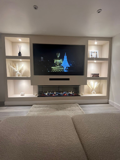 Media Wall featuring architectural display alcove niches with warm lighting